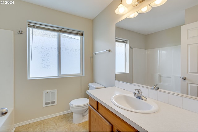 bathroom with toilet and vanity