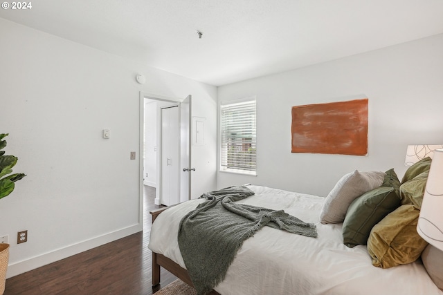 bedroom featuring dark hardwood / wood-style floors