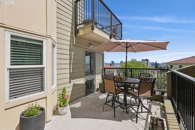 view of patio / terrace with a balcony