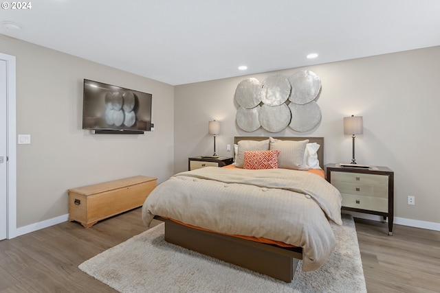 bedroom featuring light hardwood / wood-style flooring