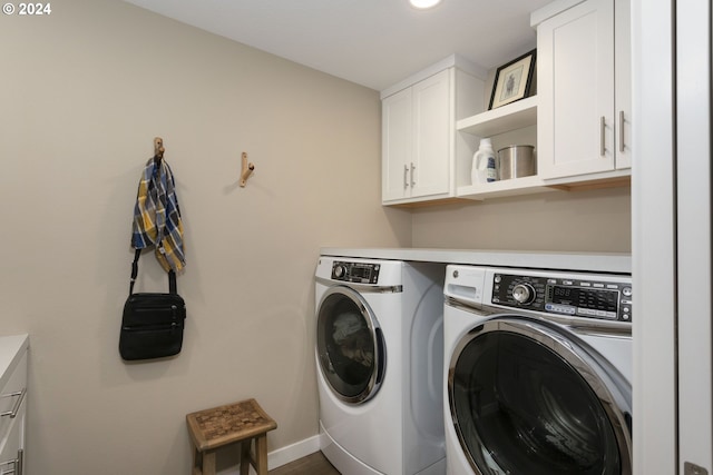 laundry room with cabinets and independent washer and dryer