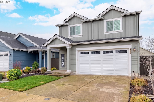 craftsman-style home with a front yard and a garage