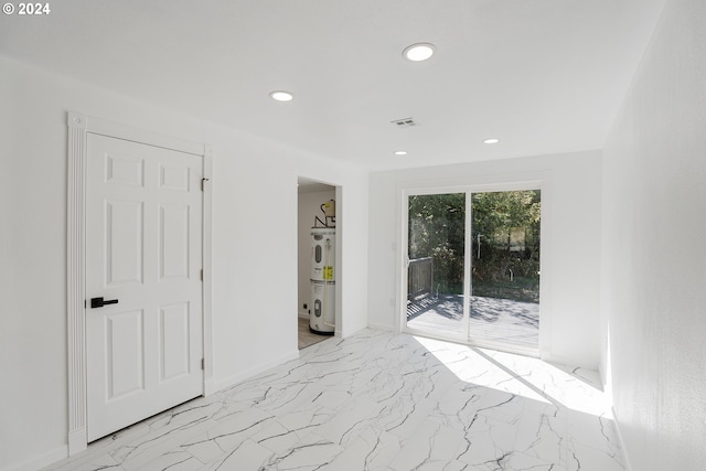 2840 Canyonville Riddle Rd, Riddle, OR 97469 - unfurnished room featuring visible vents, baseboards, electric water heater, recessed lighting, and marble finish floor