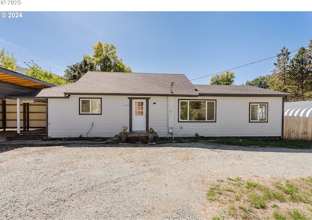2840 Canyonville Riddle Rd, Riddle, OR 97469 - ranch-style house with a carport, a mountain view, fence, and driveway