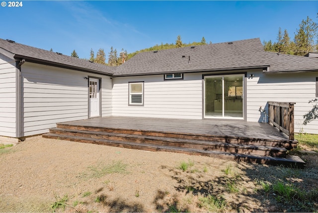 2840 Canyonville Riddle Rd, Riddle, OR 97469 - rear view of house with roof with shingles and a deck