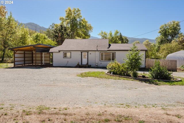 2840 Canyonville Riddle Rd, Riddle, OR 97469 - ranch-style home featuring roof with shingles and fence