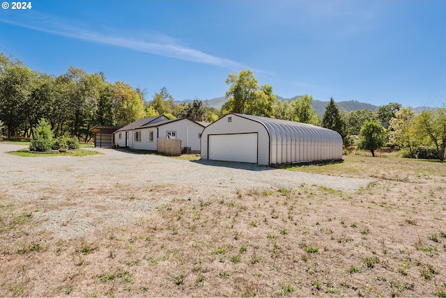 2840 Canyonville Riddle Rd, Riddle, OR 97469 - garage with a mountain view