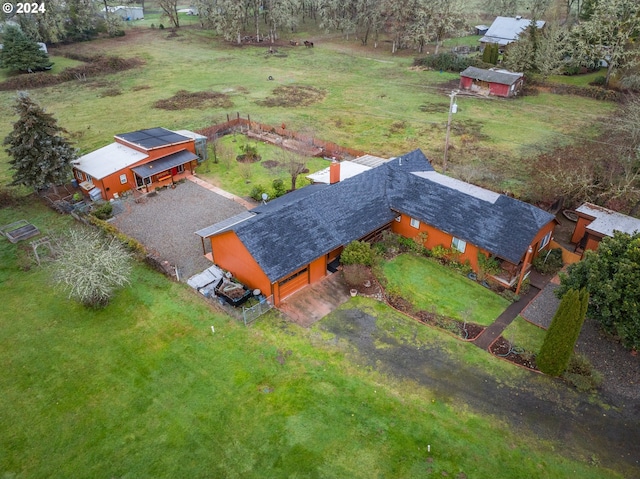 birds eye view of property featuring a rural view