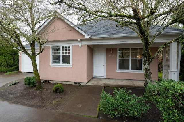 view of front of home featuring a garage