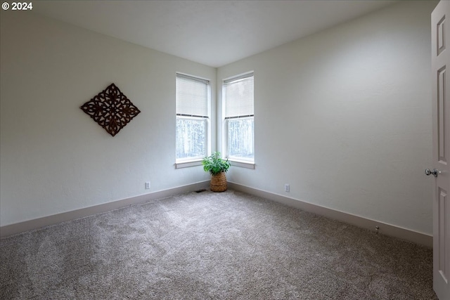 empty room with carpet floors