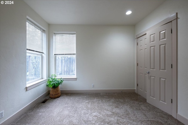 empty room with carpet floors