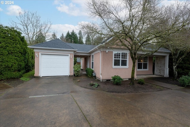 ranch-style house featuring a garage