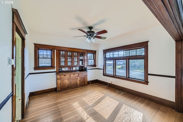 234 Loves Ave, Woodland, WA 98674 - unfurnished room with wood-type flooring, baseboards, a ceiling fan, and visible vents
