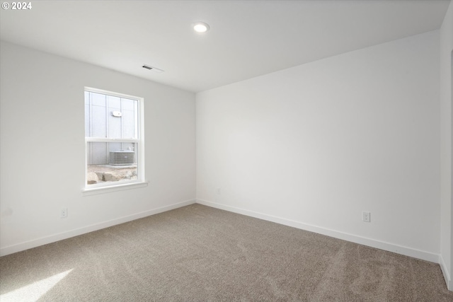 spare room with carpet floors