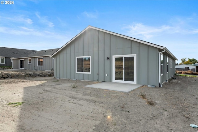 rear view of house featuring a patio area