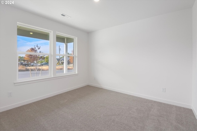 view of carpeted spare room