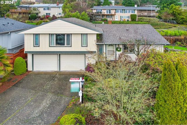 split level home featuring a garage