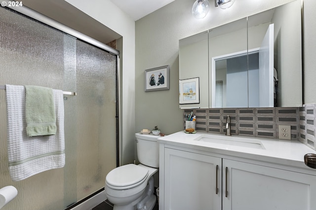 bathroom with vanity, a baseboard radiator, toilet, and an enclosed shower