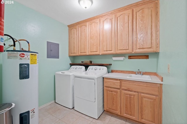 clothes washing area featuring cabinets, light tile patterned flooring, sink, washing machine and dryer, and water heater