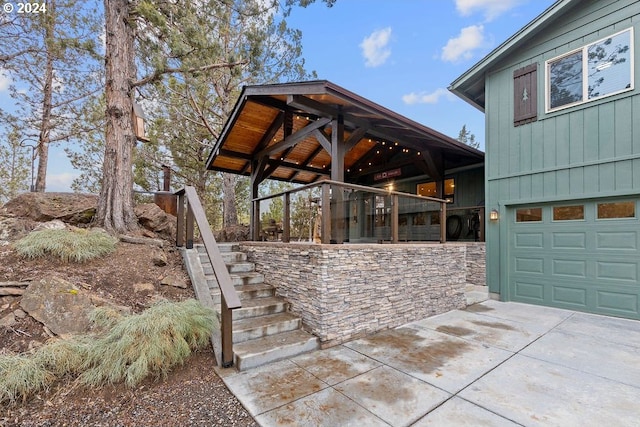 view of patio / terrace with a garage