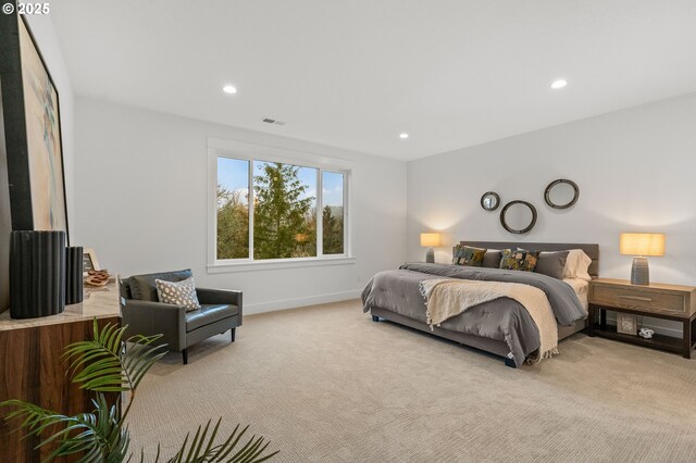 bedroom with light carpet