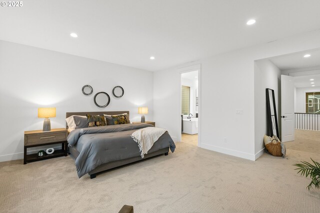 carpeted bedroom with ensuite bathroom