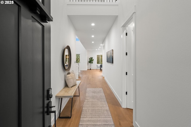 corridor featuring light wood-type flooring