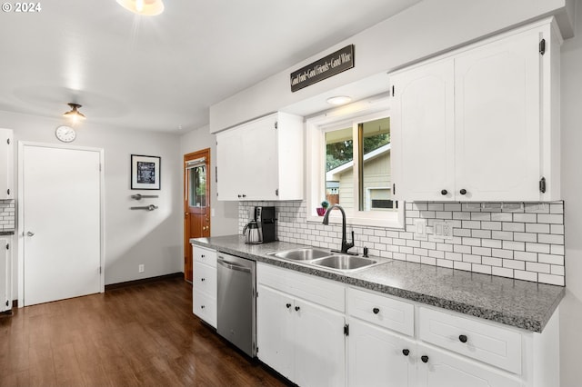 kitchen with stainless steel dishwasher, sink, white cabinetry, and dark wood-type flooring