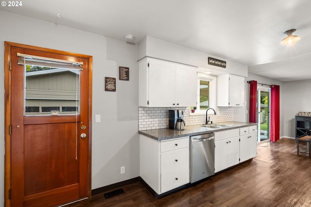 kitchen featuring sink, dishwasher, white cabinetry, and plenty of natural light