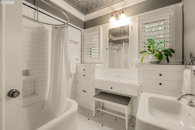 2130 NE Klickitat St, Portland, OR 97212 - bathroom featuring crown molding, an ornate ceiling, shower / bath combination with curtain, tile patterned floors, and a sink