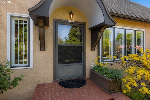 2130 NE Klickitat St, Portland, OR 97212 - doorway to property featuring stucco siding