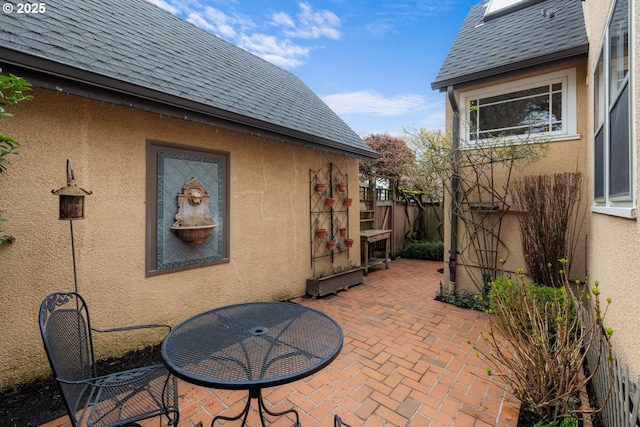 view of patio / terrace with fence