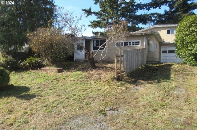 exterior space with a garage