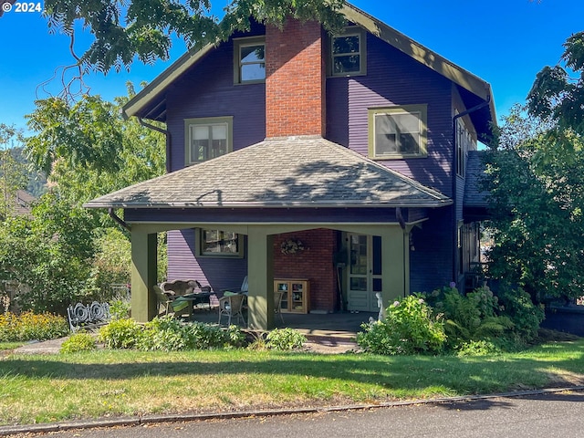 front of property with a front yard