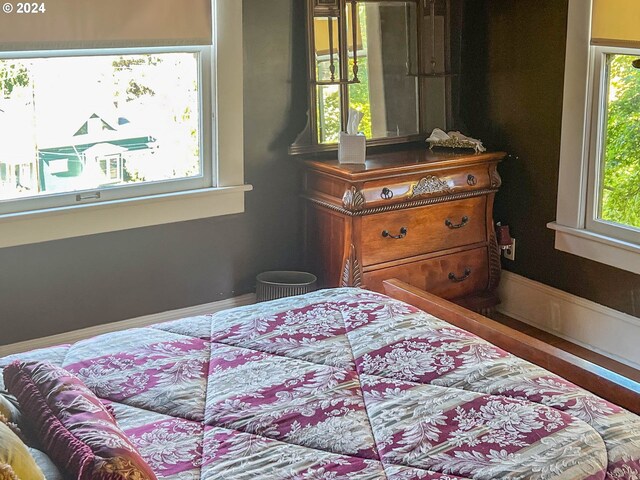 bedroom featuring multiple windows