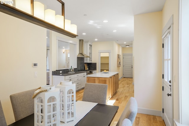 dining area with light hardwood / wood-style flooring