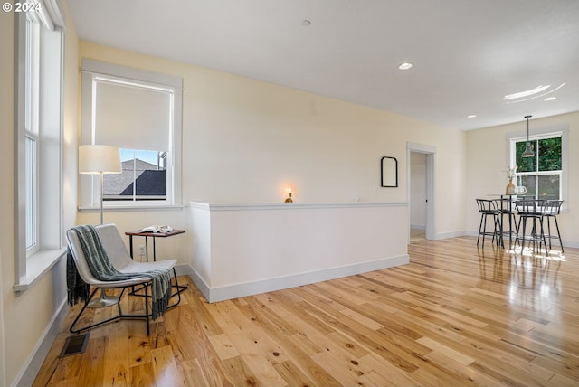 sitting room with light wood-type flooring