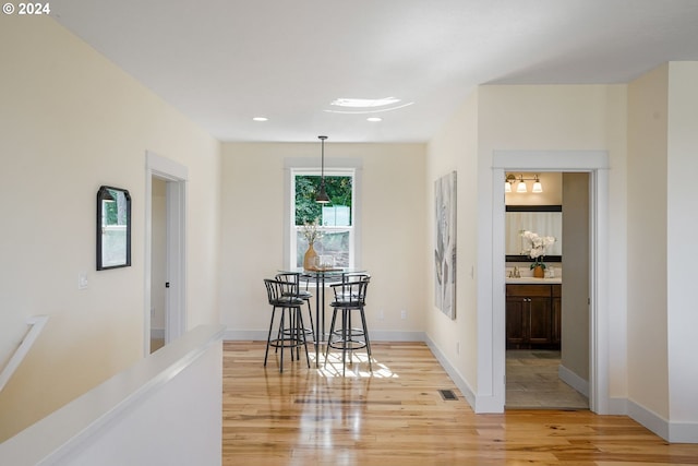 dining room with light hardwood / wood-style floors