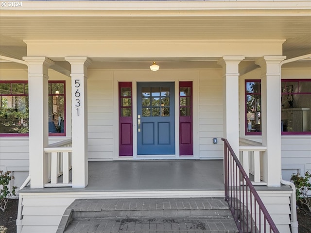 entrance to property with covered porch