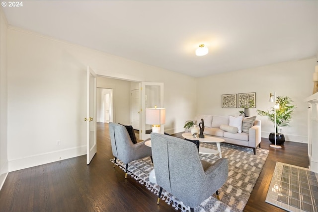 living room with dark hardwood / wood-style floors