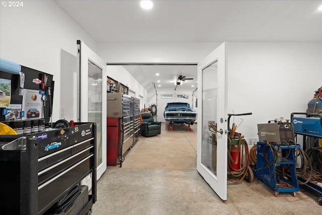 interior space with ceiling fan