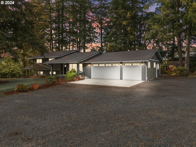 view of front of property with a garage