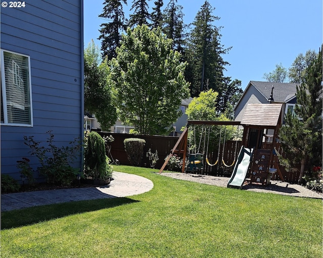 view of yard with a playground