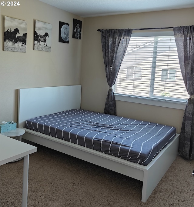 bedroom featuring carpet flooring