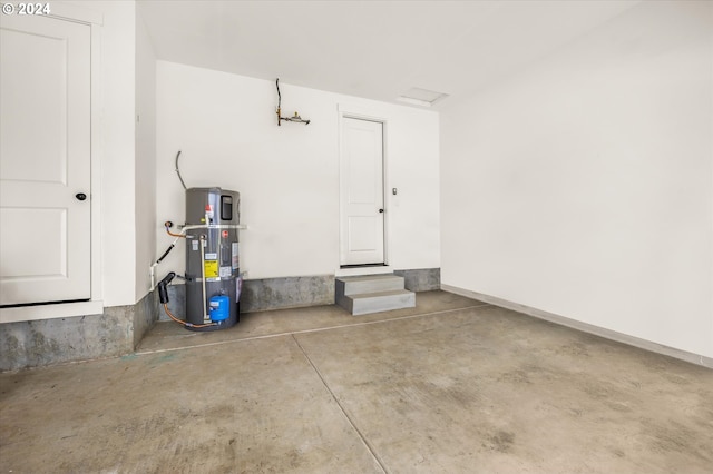 garage with strapped water heater