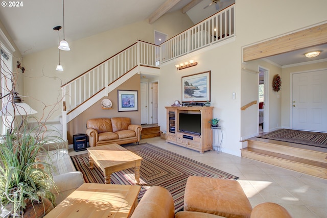 living room featuring crown molding, light tile patterned flooring, and high vaulted ceiling