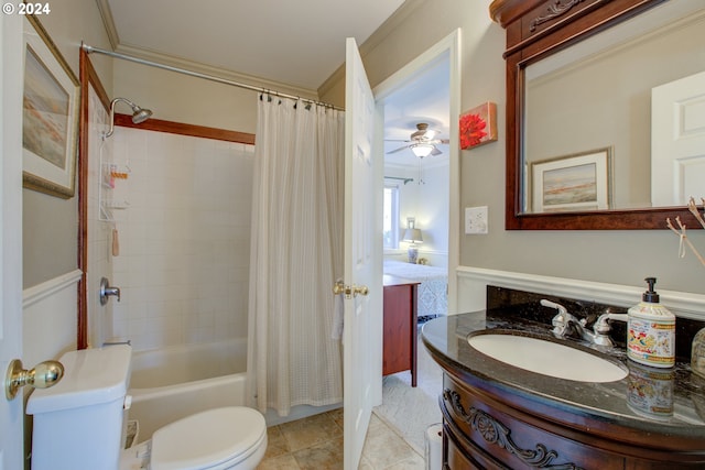 full bathroom featuring ceiling fan, tile patterned floors, vanity, shower / tub combo, and ornamental molding