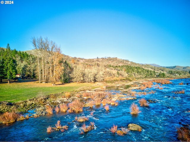 14115 N Bank Rd, Roseburg, OR 97470 - water view with a mountain backdrop
