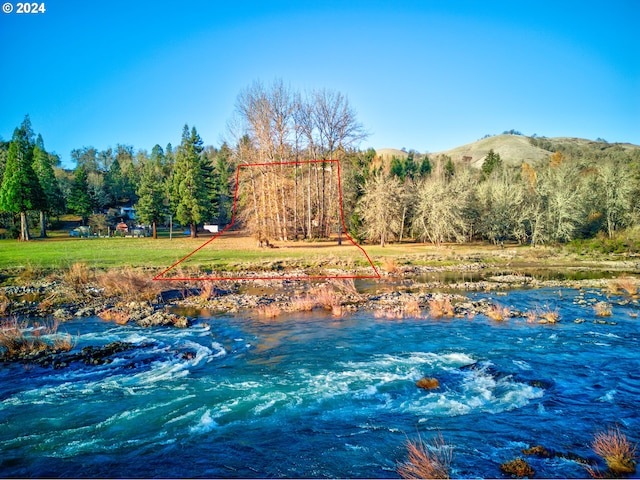 14115 N Bank Rd, Roseburg, OR 97470 - water view featuring a mountain backdrop