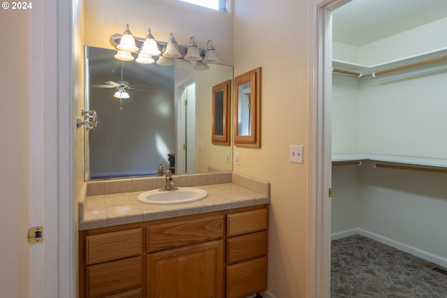 bathroom with vanity and ceiling fan